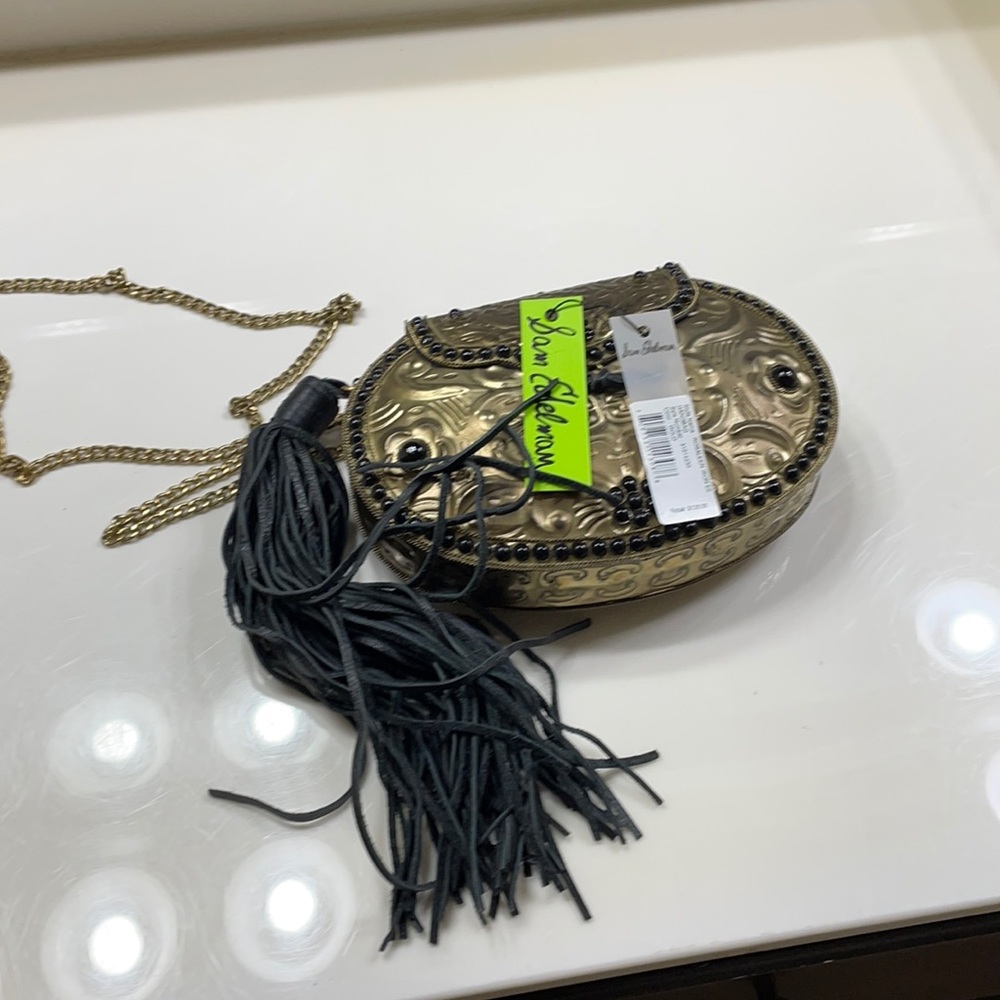 Metallic purse by Sam Edelman